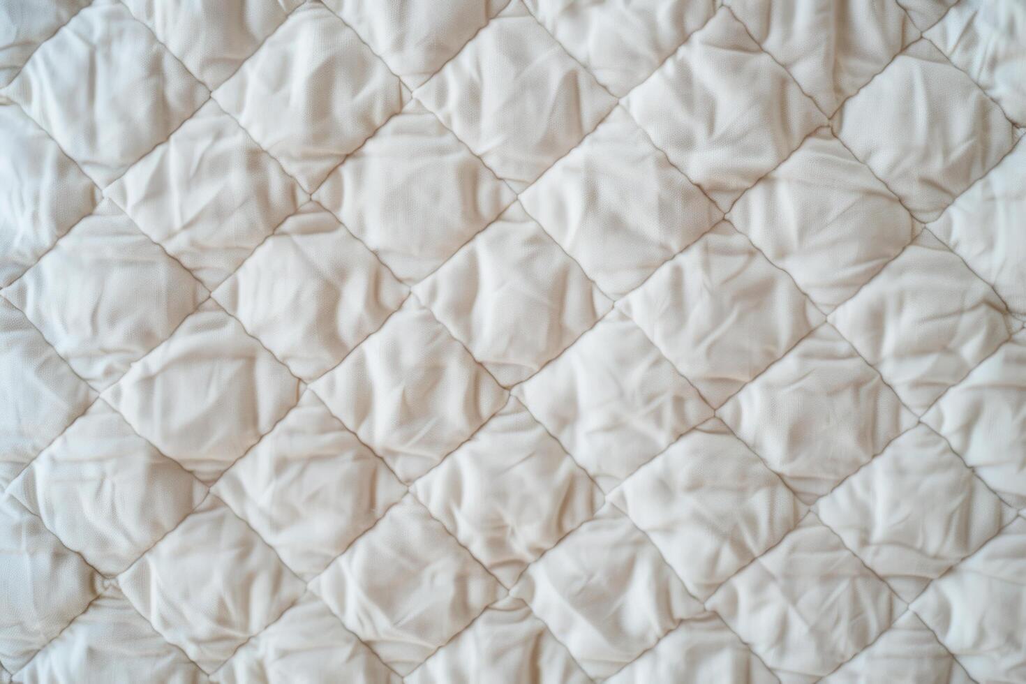 Matelasse texture backgrounds resemble quilted or padded fabrics with a raised, intricate pattern photo