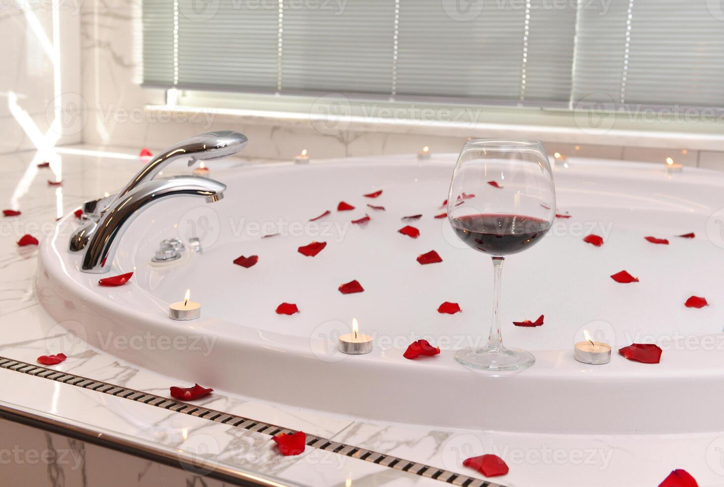 Luxury Hotel room with jacuzzi and red vines photo