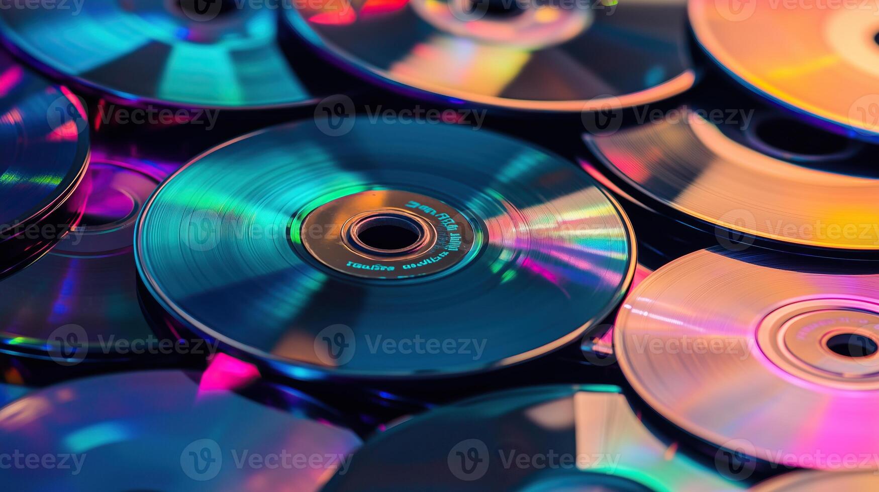 Colorful stack of CDs in a chaotic pile photo