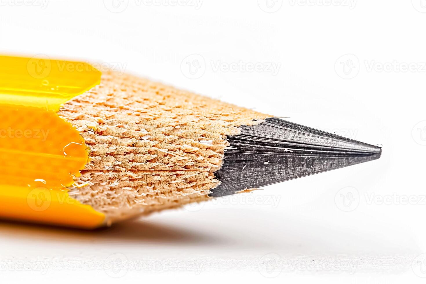 Sharpened yellow pencil on white background photo