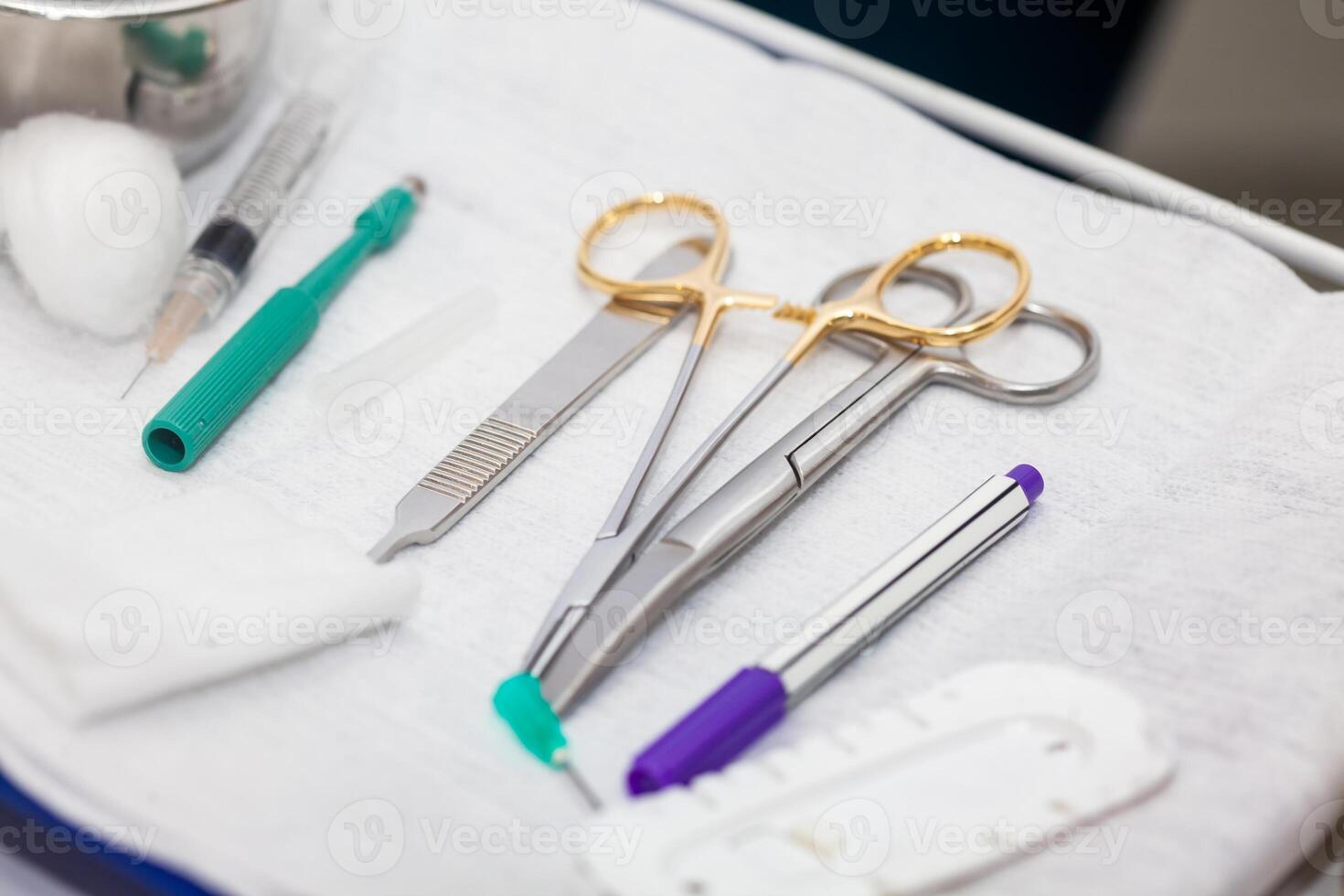 Surgical instruments for performing a small surgery procedure at the dermatologists office photo