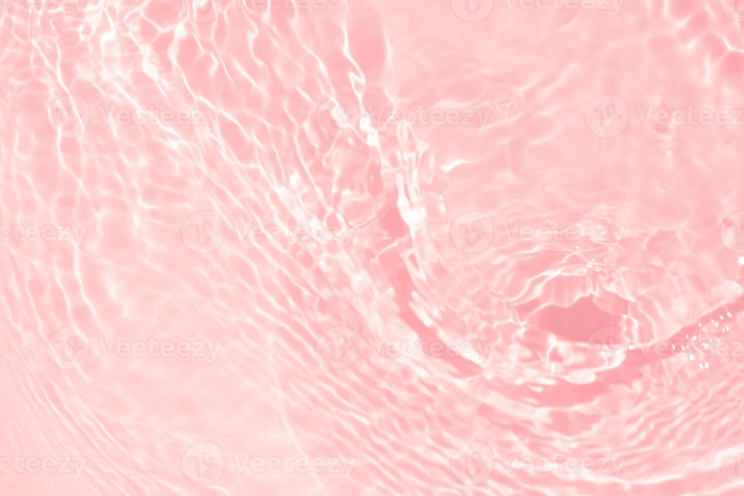 Bluewater waves on the surface ripples blurred. Defocus blurred transparent blue colored clear calm water surface texture with splash and bubbles. Water waves with shining pattern texture background. photo