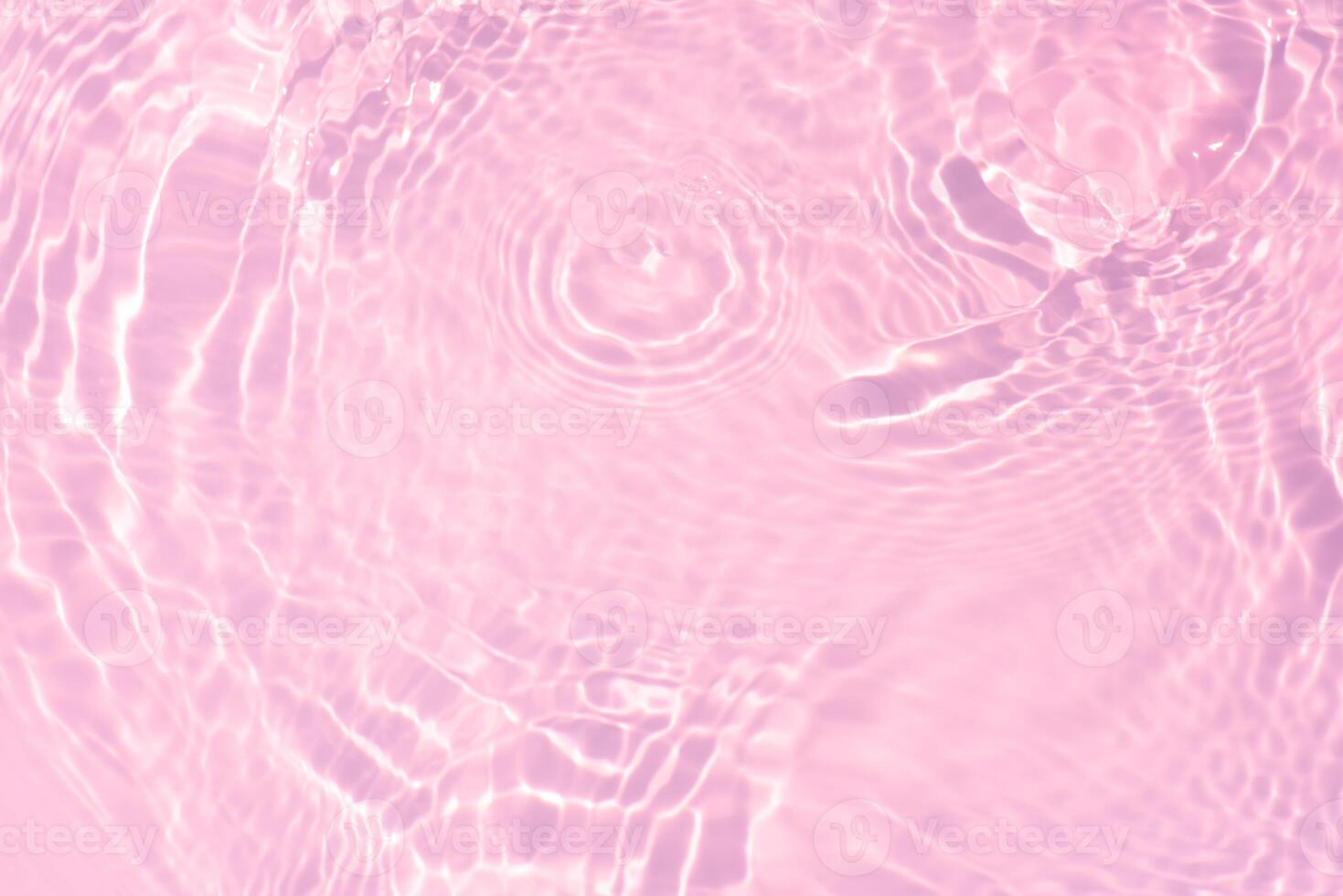 Blue water with ripples on the surface. Defocus blurred transparent blue colored clear calm water surface texture with splashes and bubbles. Water waves with shining pattern texture background. photo