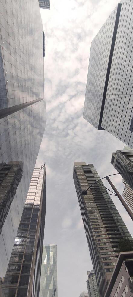 Skyscrapers view from below, urban architecture of the metropolis photo