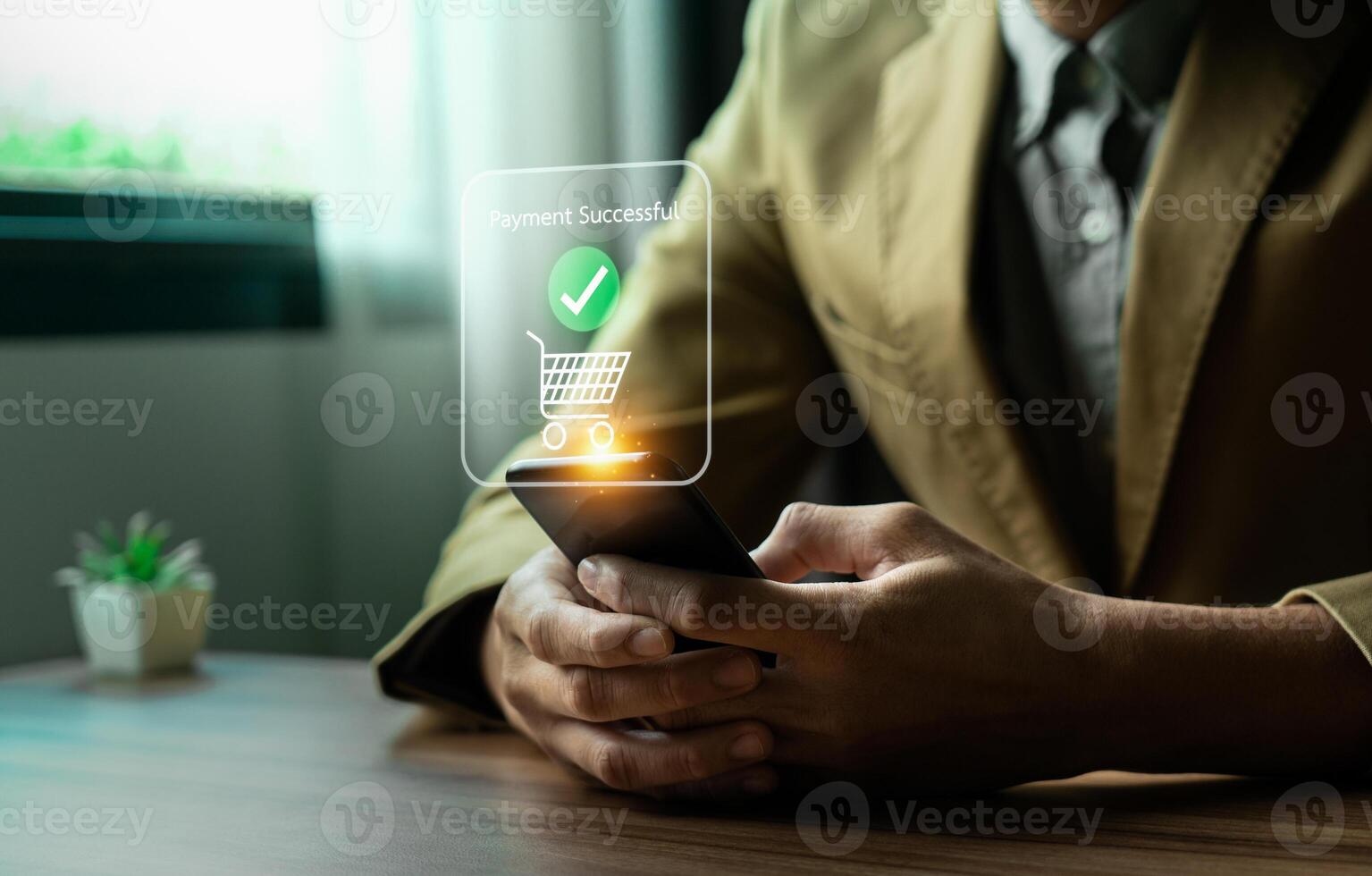 Person Making Online Payment with Credit Card on Laptop, Holographic Interface Showing Payment Successful and Shopping Icons, Representing E-commerce and Digital Transactions photo