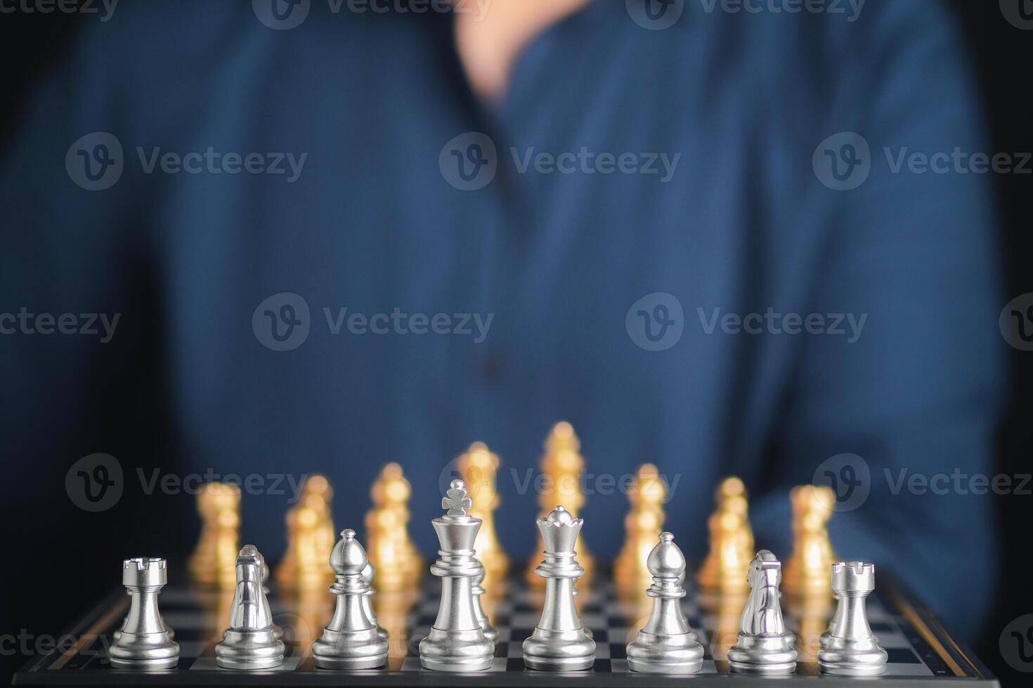 Chessboard game for ideas and competition. Businessman playing chess board game for development analysis new strategic planning. Strategy and business success concept photo