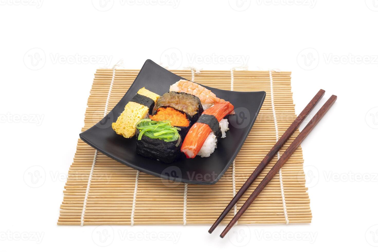 Sushi on black square plate, Asian food, Japanese. Isolated on background photo