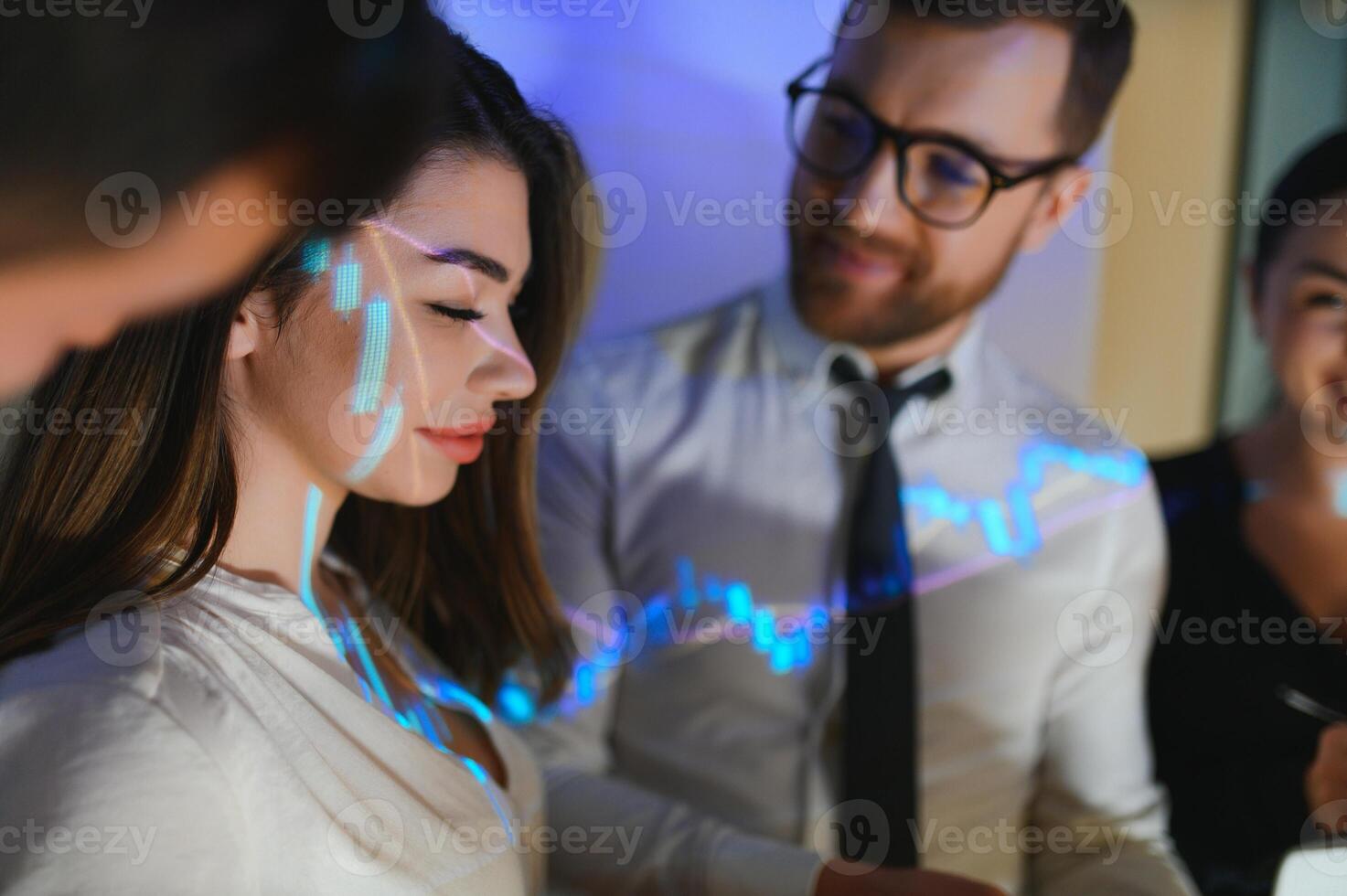 Group of business people working. Technical price graph and indicator, red and blue candlestick chart and stock trading computer screen background. Traders analyzing data photo