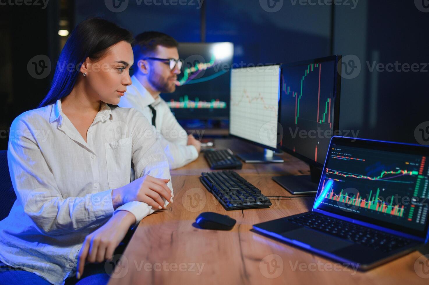 Business team investment working with computer, planning and analyzing graph stock market trading with stock chart data photo