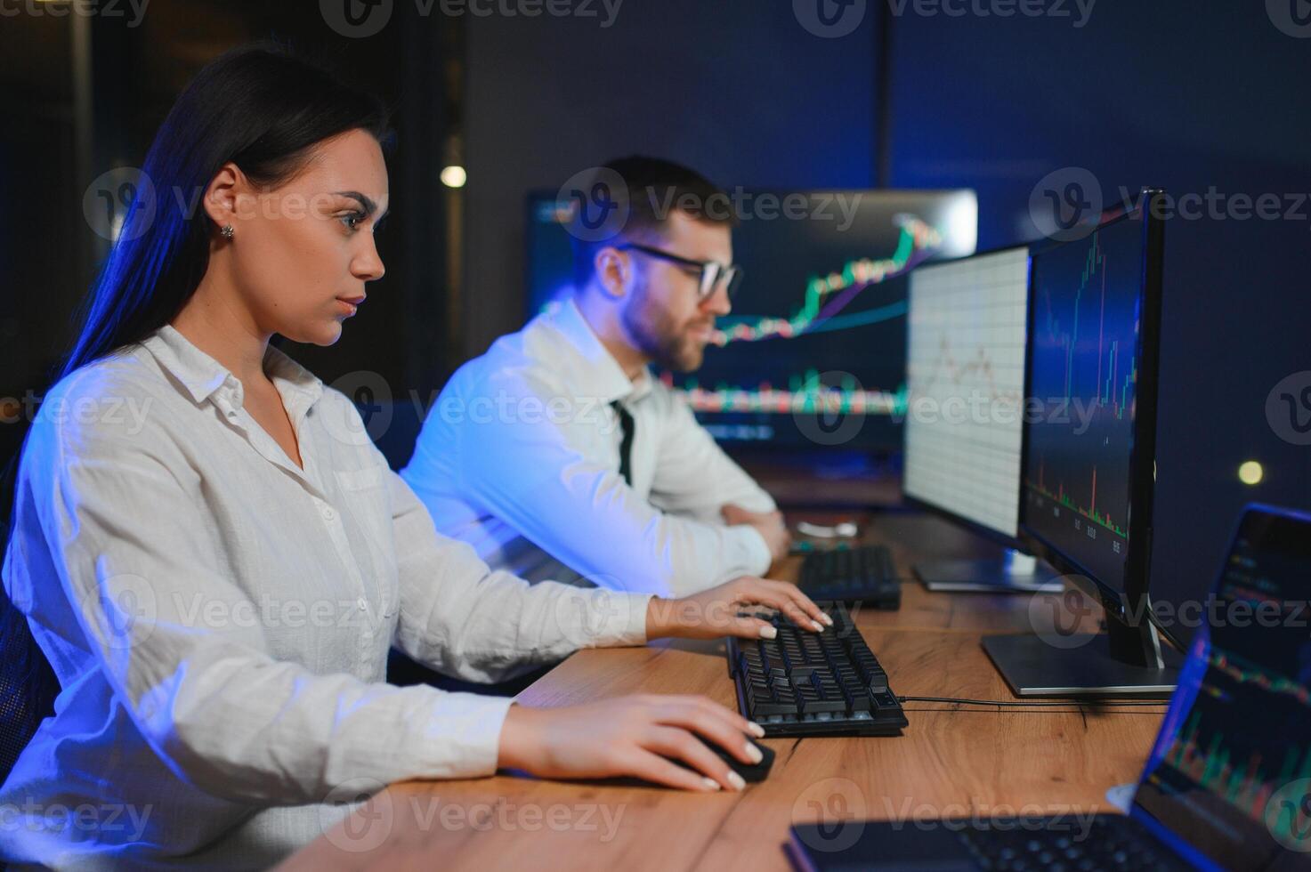 Business team investment working with computer, planning and analyzing graph stock market trading with stock chart data photo