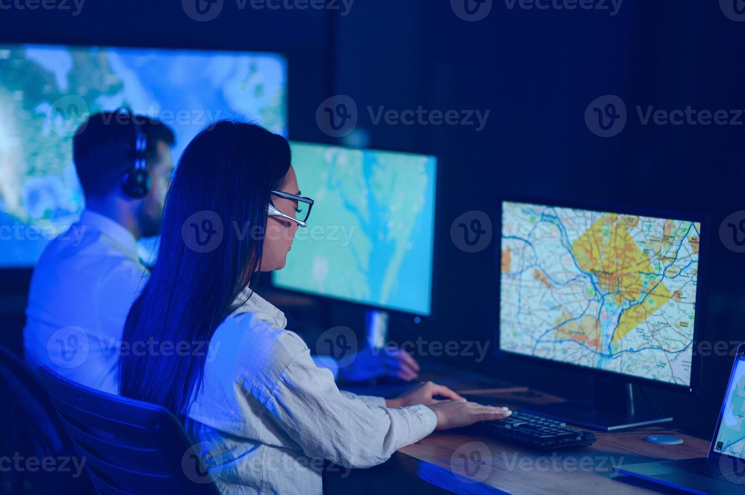 Diverse call center operators team use computers consulting clients in office photo