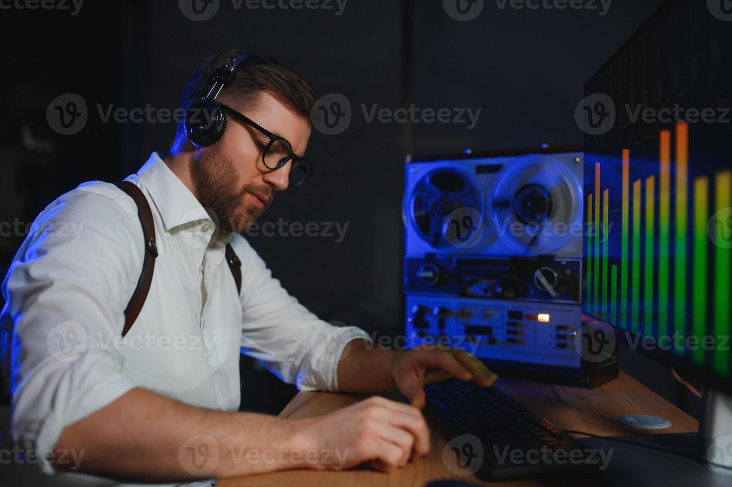 A police officer records a telephone conversation on a tape recorder. secret agent photo