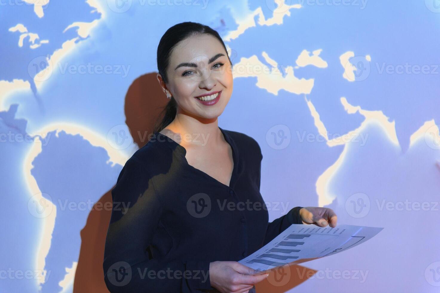 Buinesswoman with world map background photo