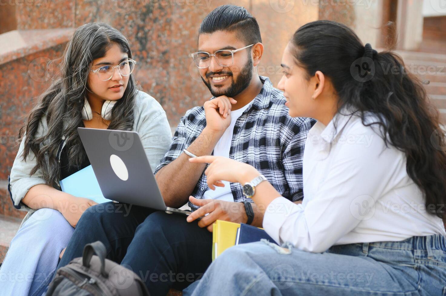 Group of Indian or Asian college students in the campus photo