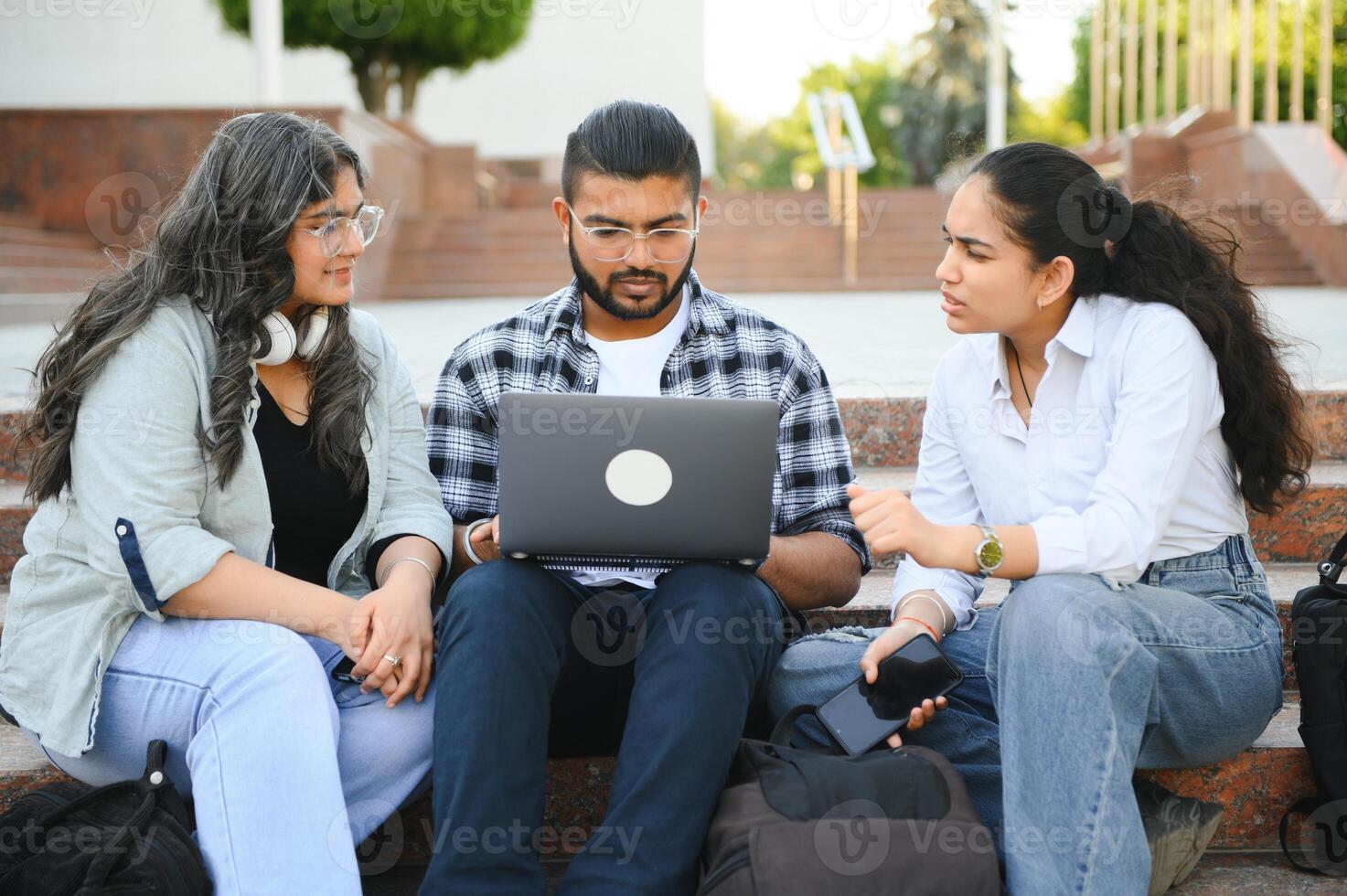 Group of Indian or Asian college students in the campus photo