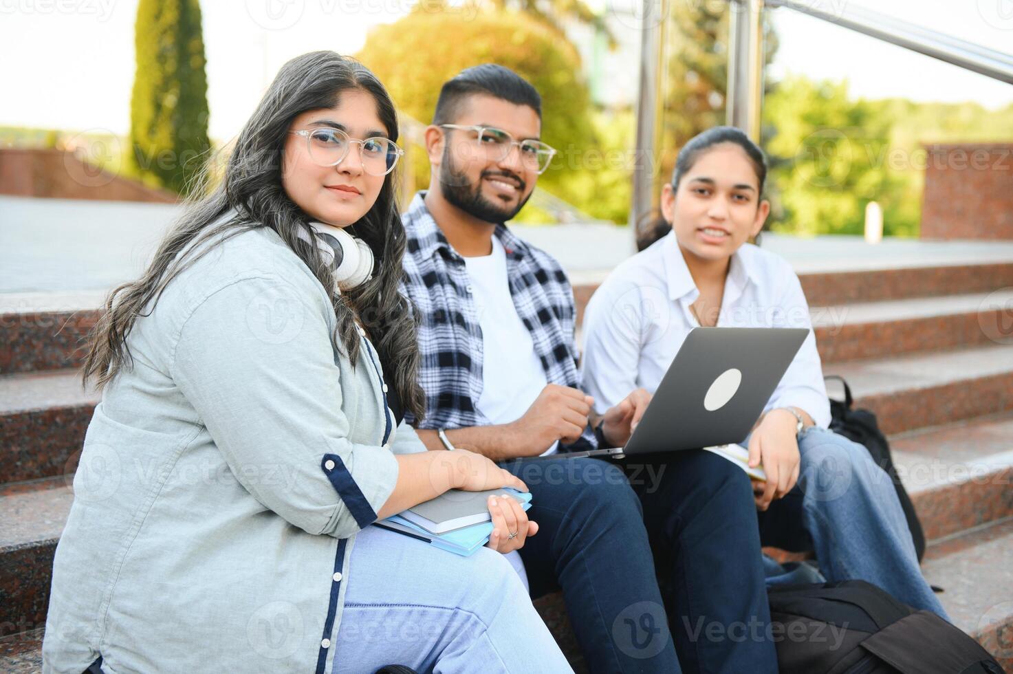Group of Indian or Asian college students in the campus photo