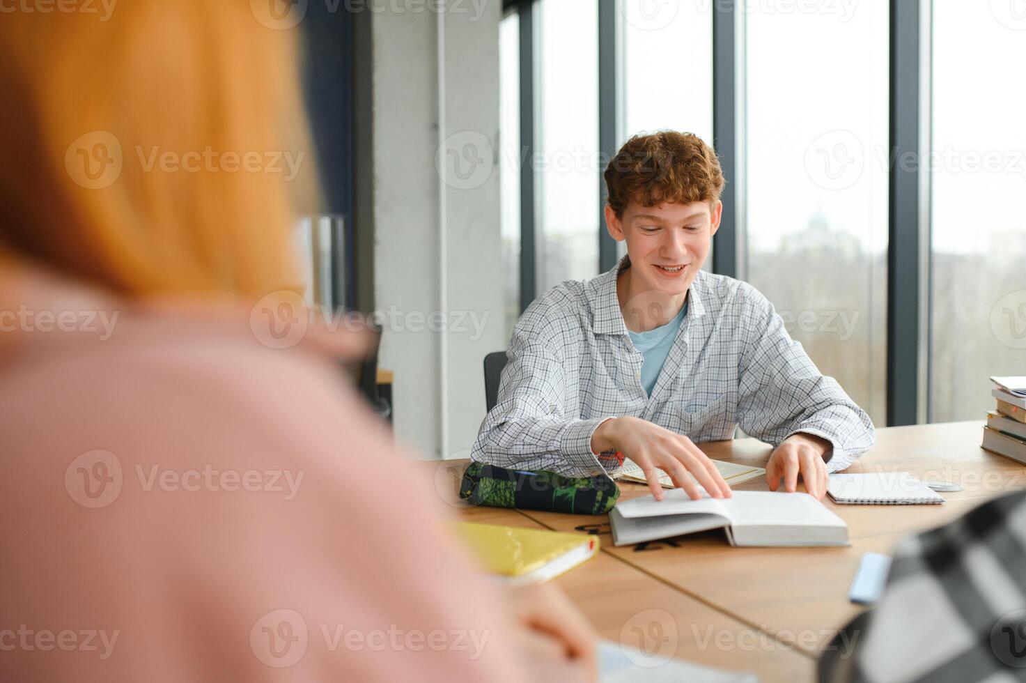 Students studying in library or classroom photo