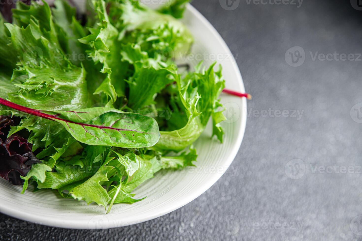 salad green leaves mix salad fresh meal food snack on the table copy space food background rustic top view keto or paleo diet vegetarian vegan food photo