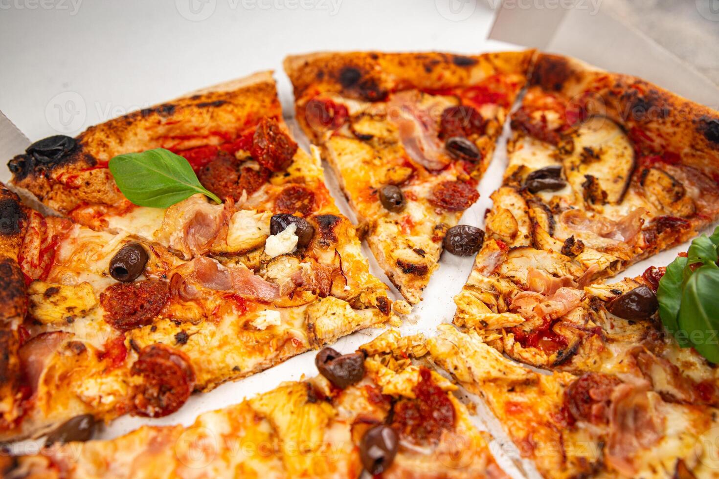 pizza chicken meat and olives, sausages, cheese, tomato sauce fresh meal food snack on the table photo