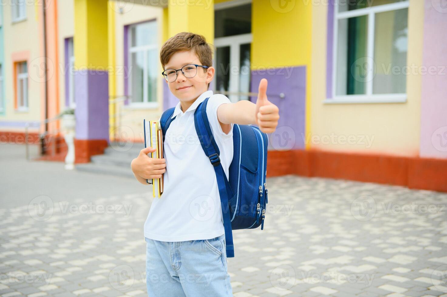 Child Riding Bicycle from School photo