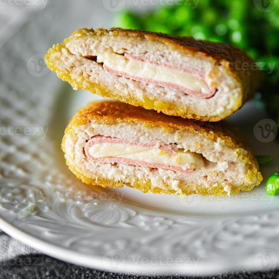 meat cutlet cordon bleu chicken, cheese, bacon meal snack on the table copy space food background photo