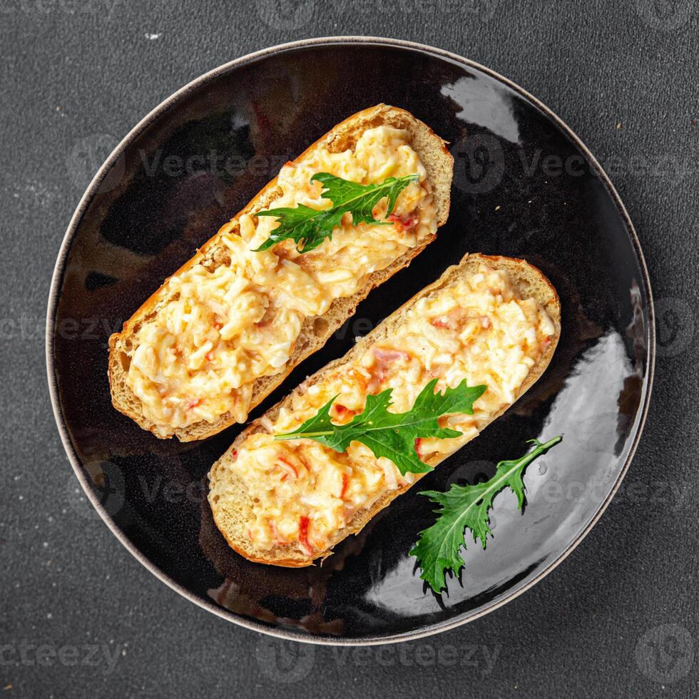 salad spread surimi and crab sticks, mayonnaise smorrebrod fresh meal food snack on the table copy space food background rustic top view photo