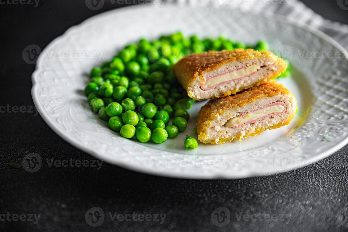 meat cutlet cordon bleu chicken, cheese, bacon meal snack on the table copy space food background photo