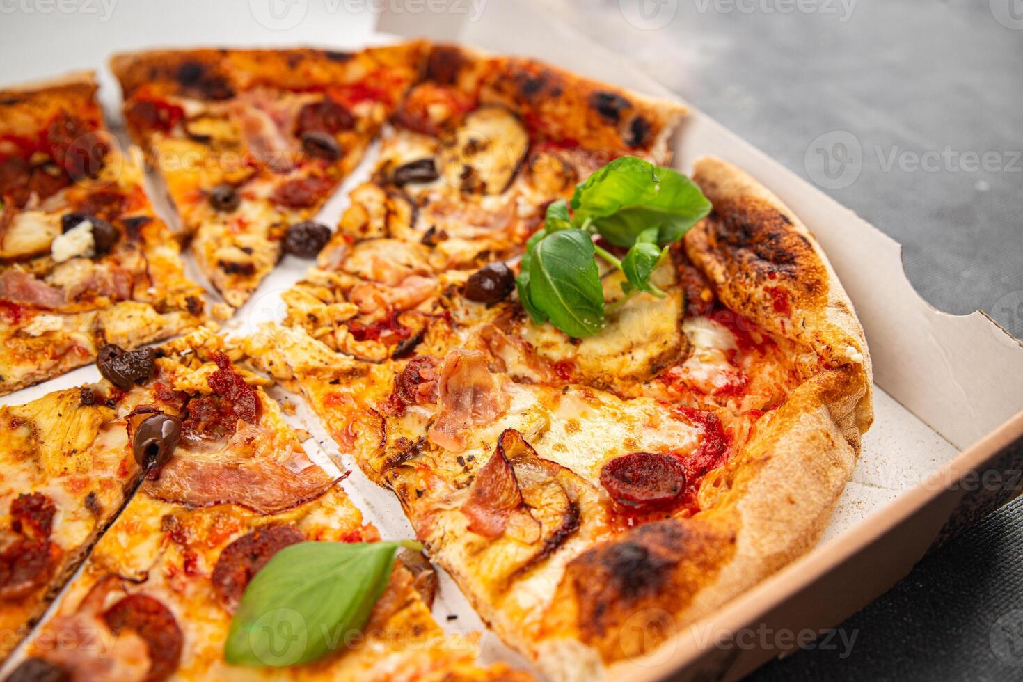 pizza chicken meat, sausages, olives, cheese, tomato saucefresh meal food snack on the table copy space food background photo