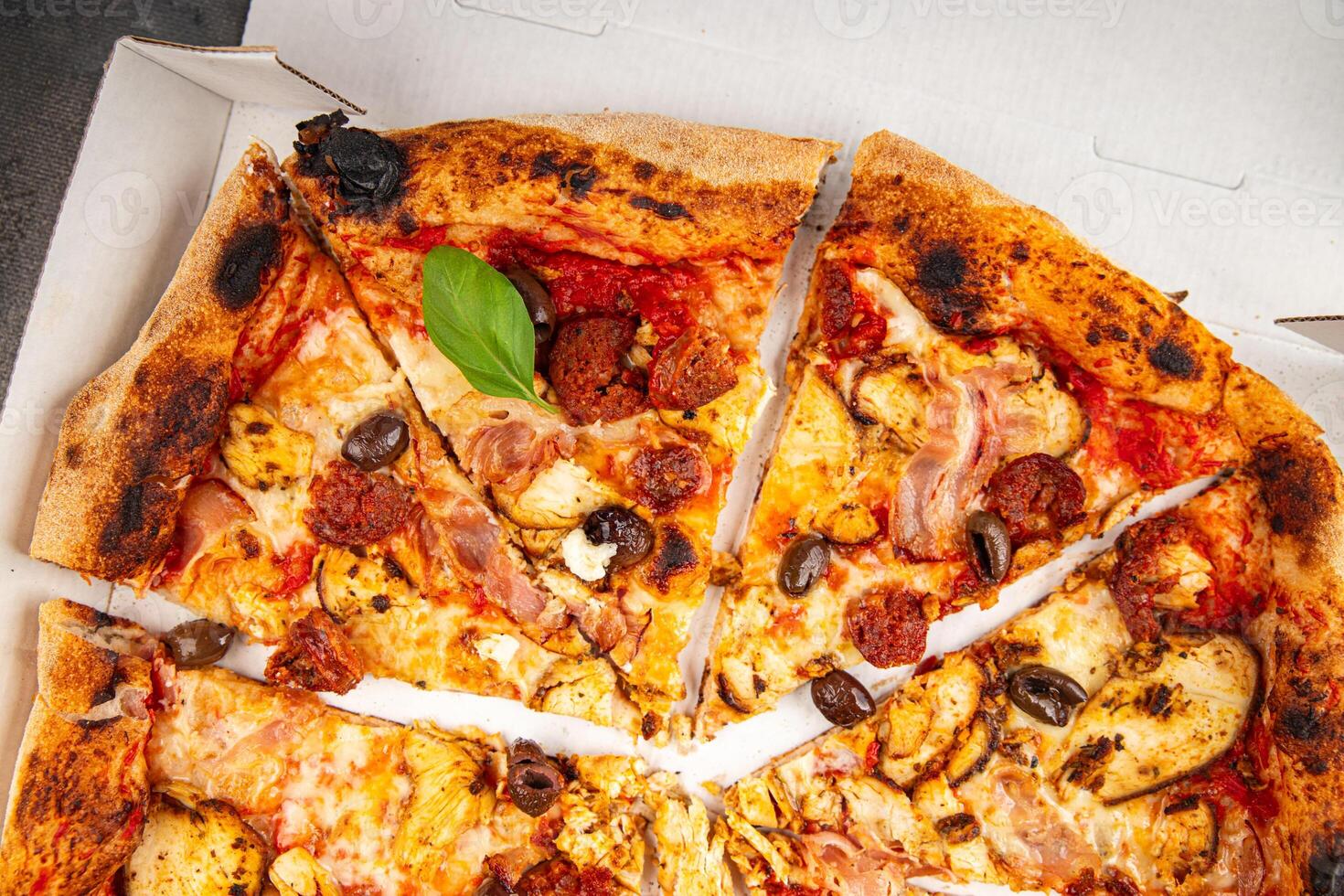 pizza chicken meat, sausages, olives, cheese, tomato saucefresh meal food snack on the table copy space food background photo