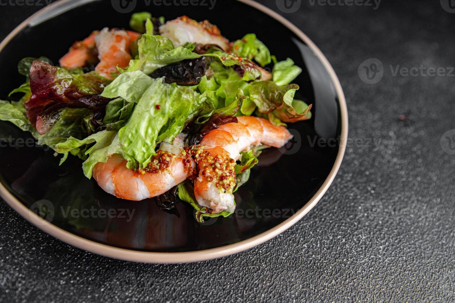 shrimp salad prawns or langoustines green leaf lettuce mix fresh meal food snack on the table copy space food background rustic top view photo