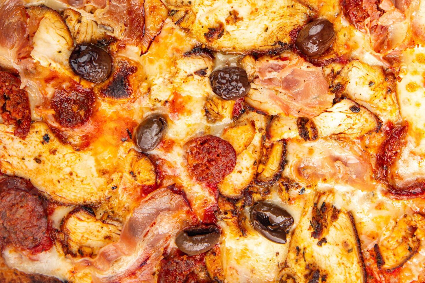 pizza chicken meat, sausages, olives, cheese, tomato saucefresh meal food snack on the table copy space food background photo