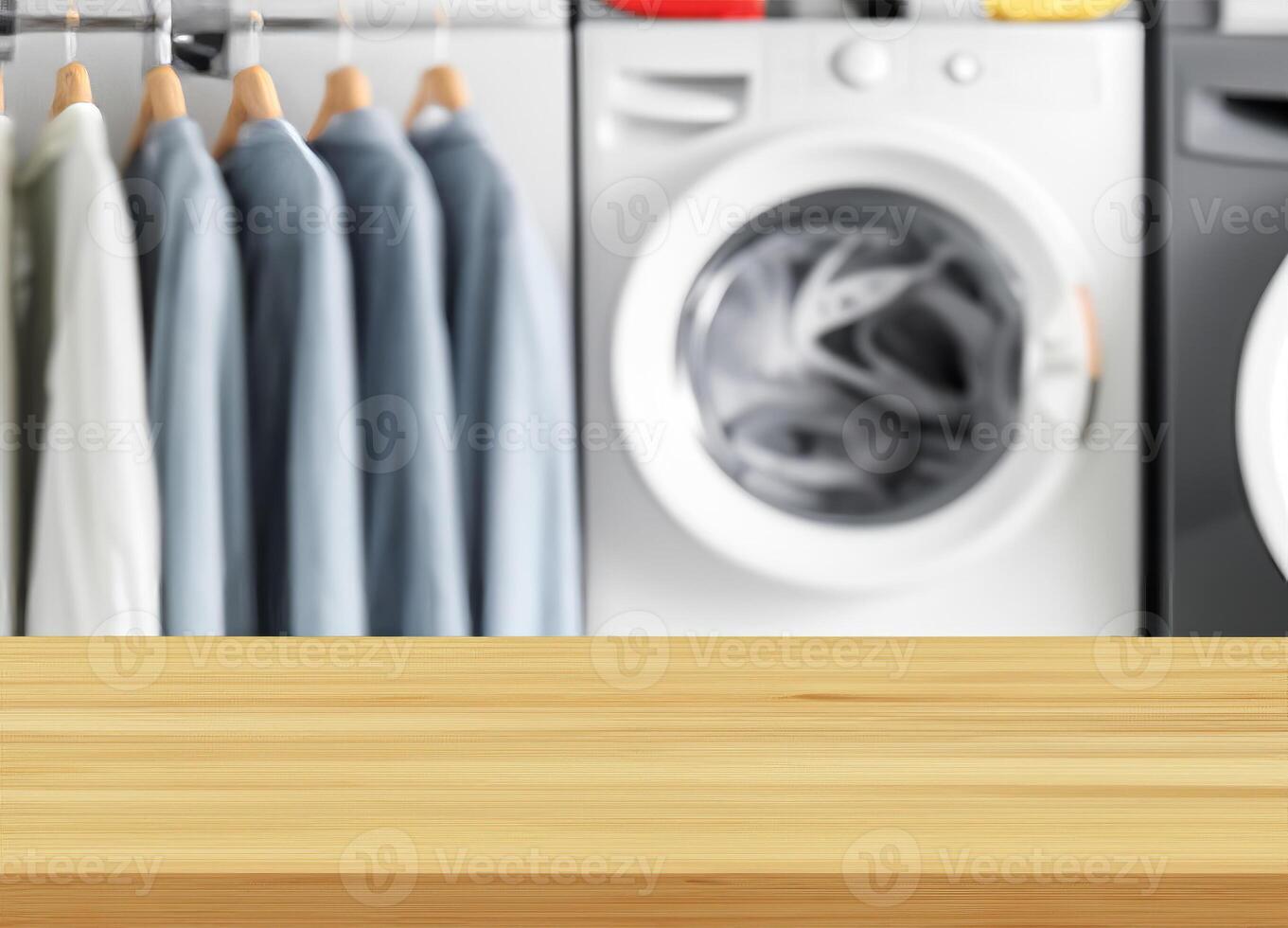 Wood table for display products on background of blurred laundry room photo
