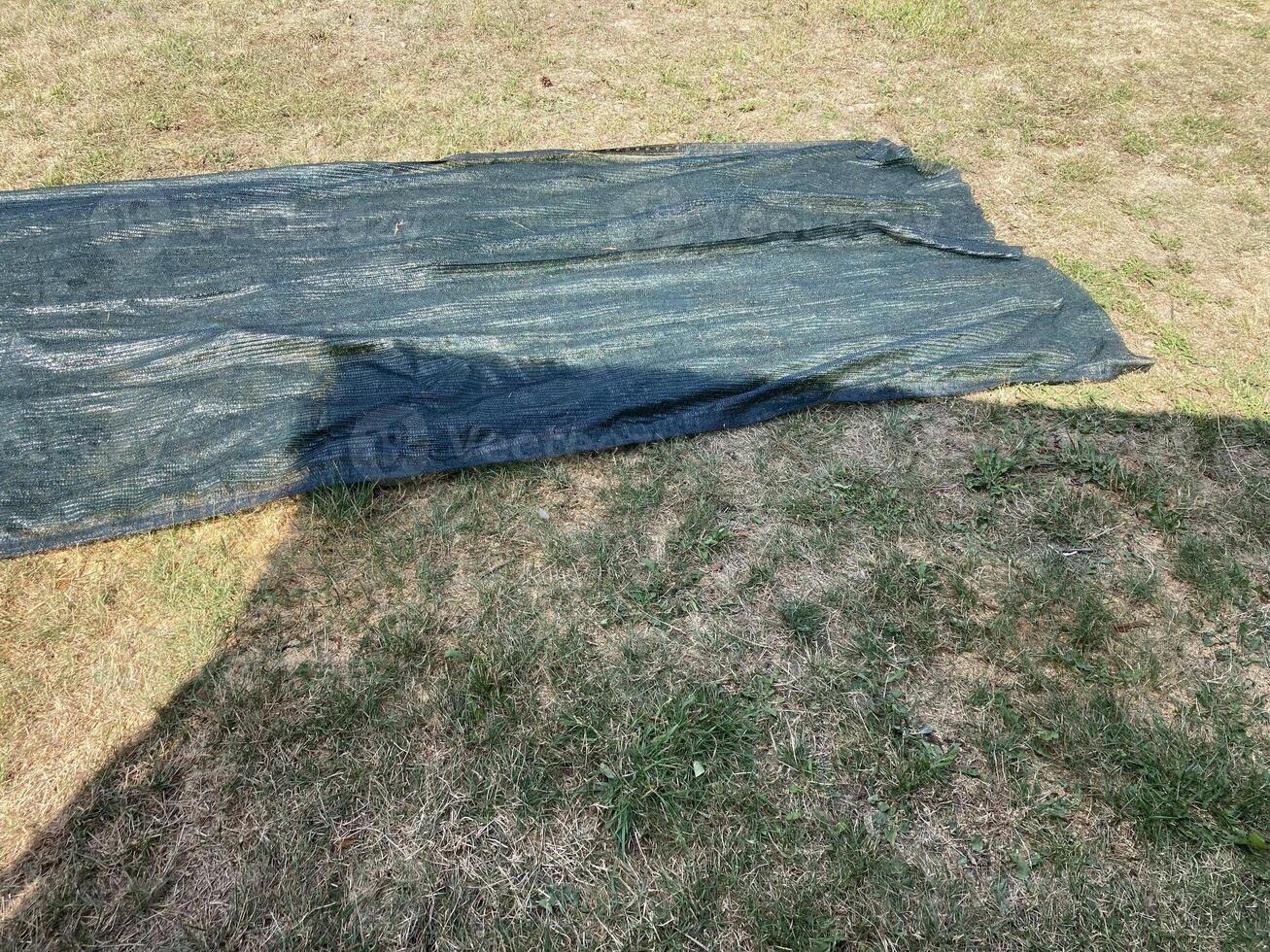 Installation of mosquito netting photo