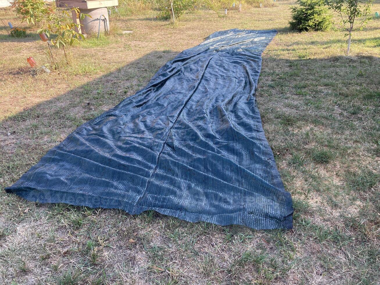 Installation of mosquito netting photo