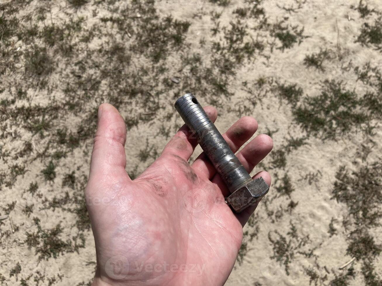 Suspension bolt in the field after harvest photo
