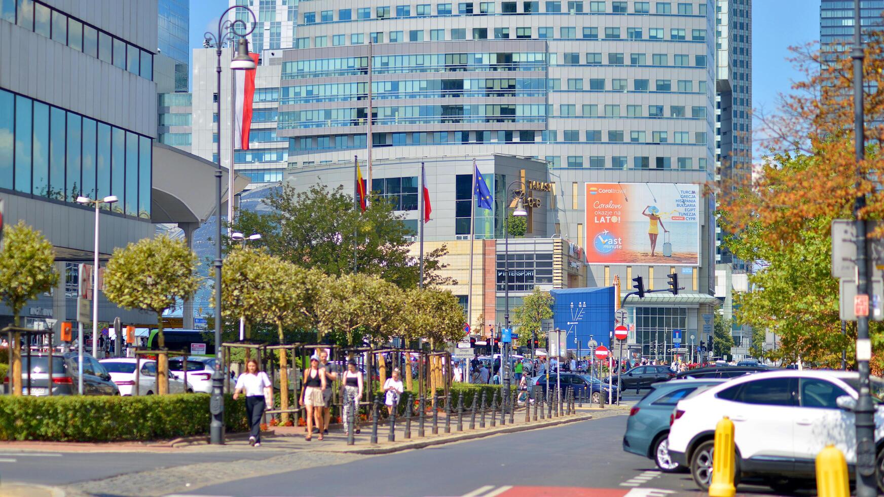 Warsaw, Poland. 17 August 2024. Urban landscape with buildings and cars in the Srodmiescie district. photo