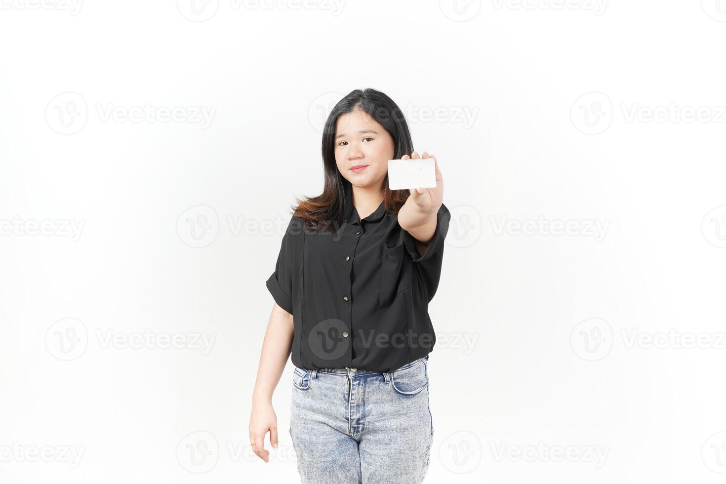 Young Asian woman presenting and showing blank card wearing Black t-shirt and jeans isolated on white background photo