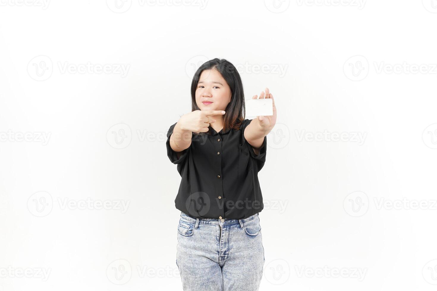 Young Asian woman presenting and showing blank card wearing Black t-shirt and jeans isolated on white background photo