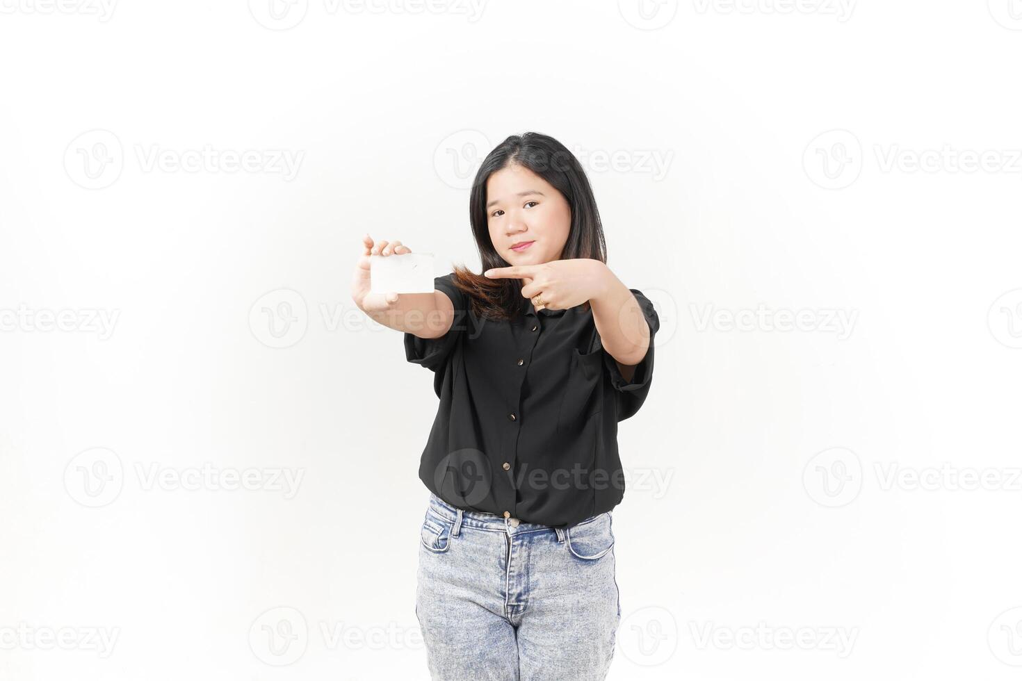 Young Asian woman presenting and showing blank card wearing Black t-shirt and jeans isolated on white background photo