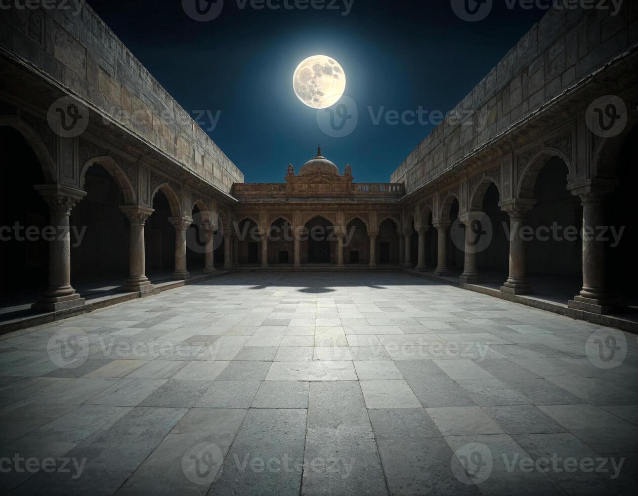 a full moon shining brightly on the night sky over an empty courtyard photo