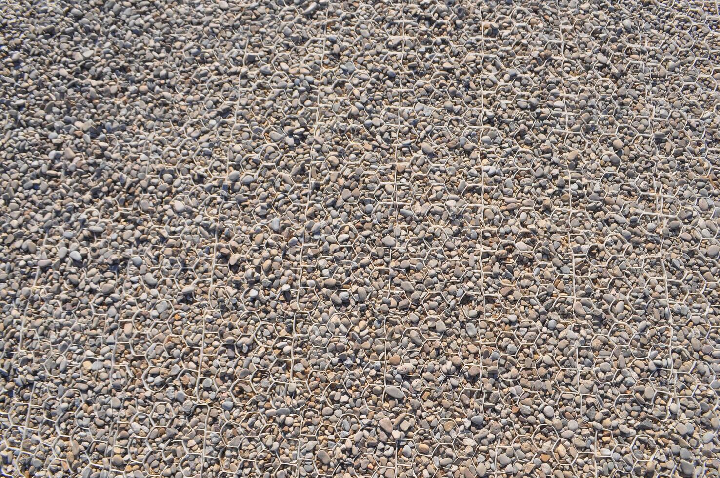 grey pebbles texture background photo