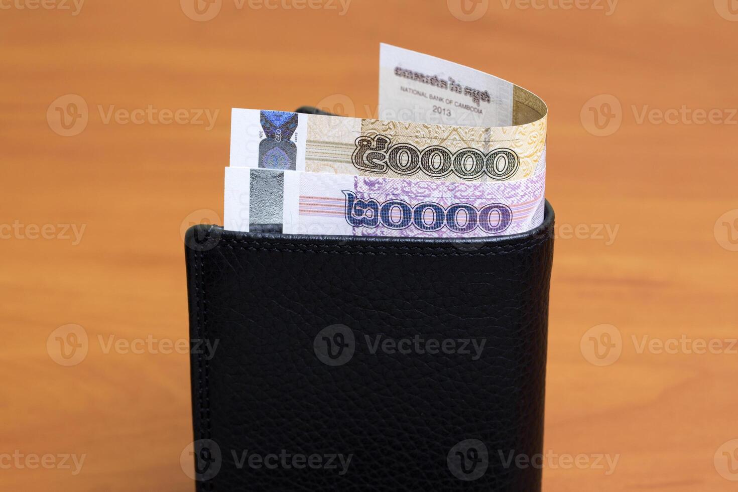 Cambodian riel in the black wallet photo