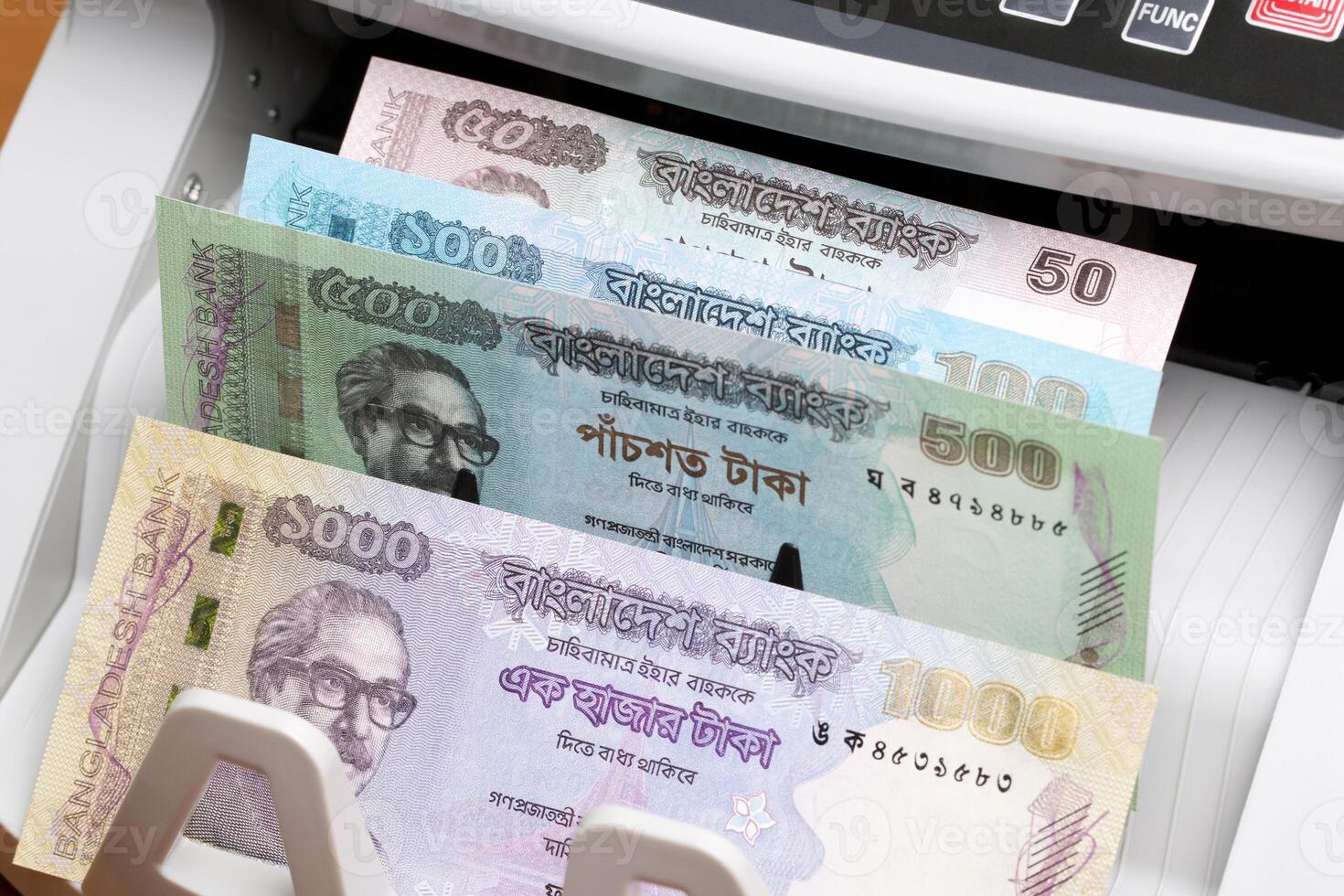 Bangladeshi taka in the counting machine photo