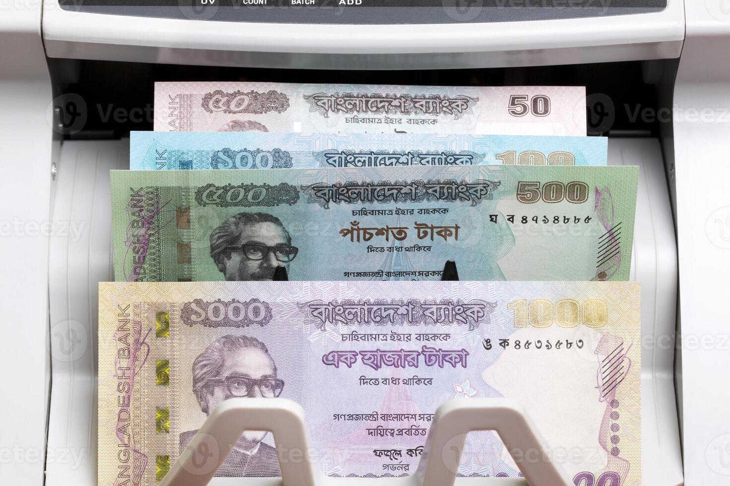 Bangladeshi taka in the counting machine photo