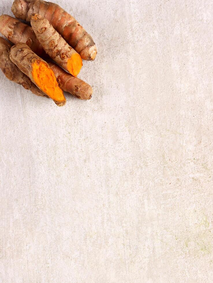 kunyit ginger herb seasoning flavor orange raw organic traditional indonesia curcuma aroma beverage photo