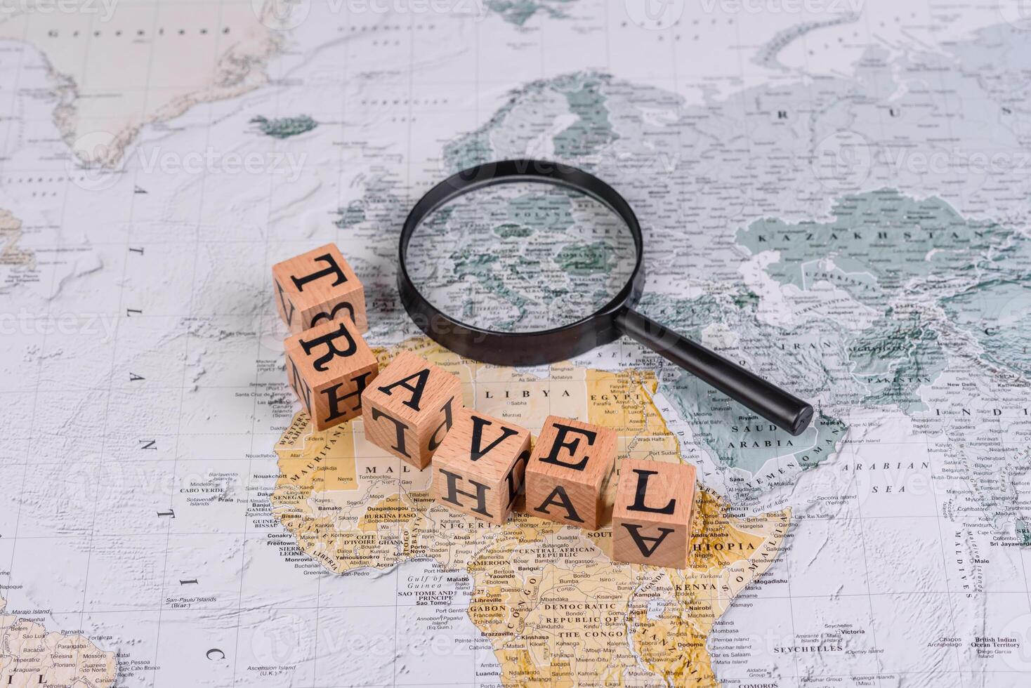 Conceptual background for travel with passport, magnifying glass, world map and money photo
