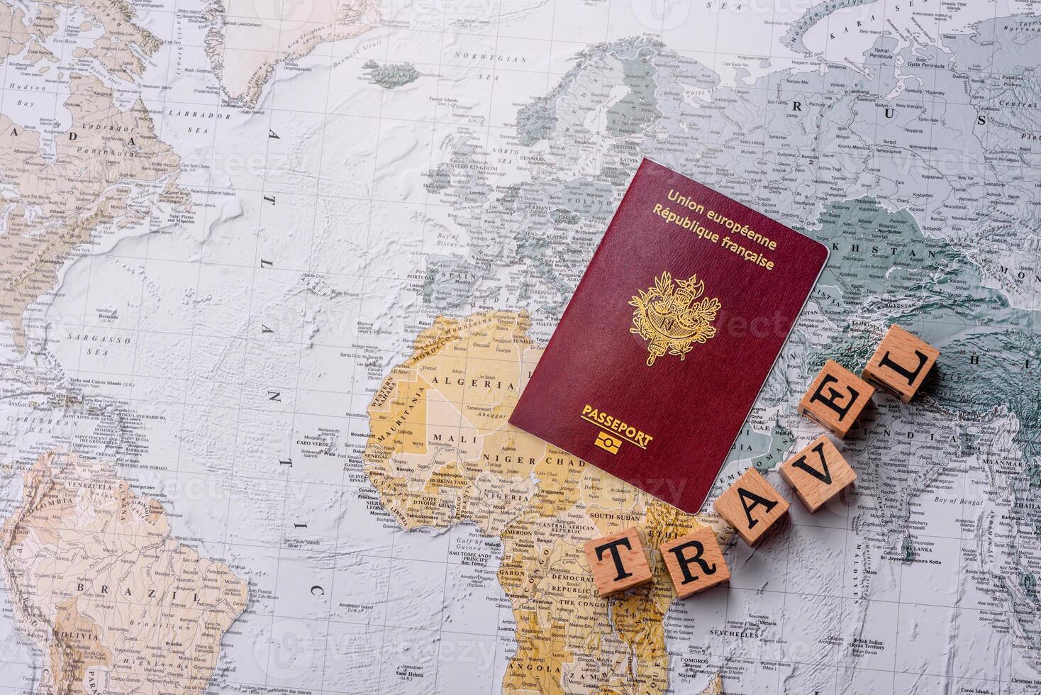 Conceptual background for travel with passport, magnifying glass, world map and money photo