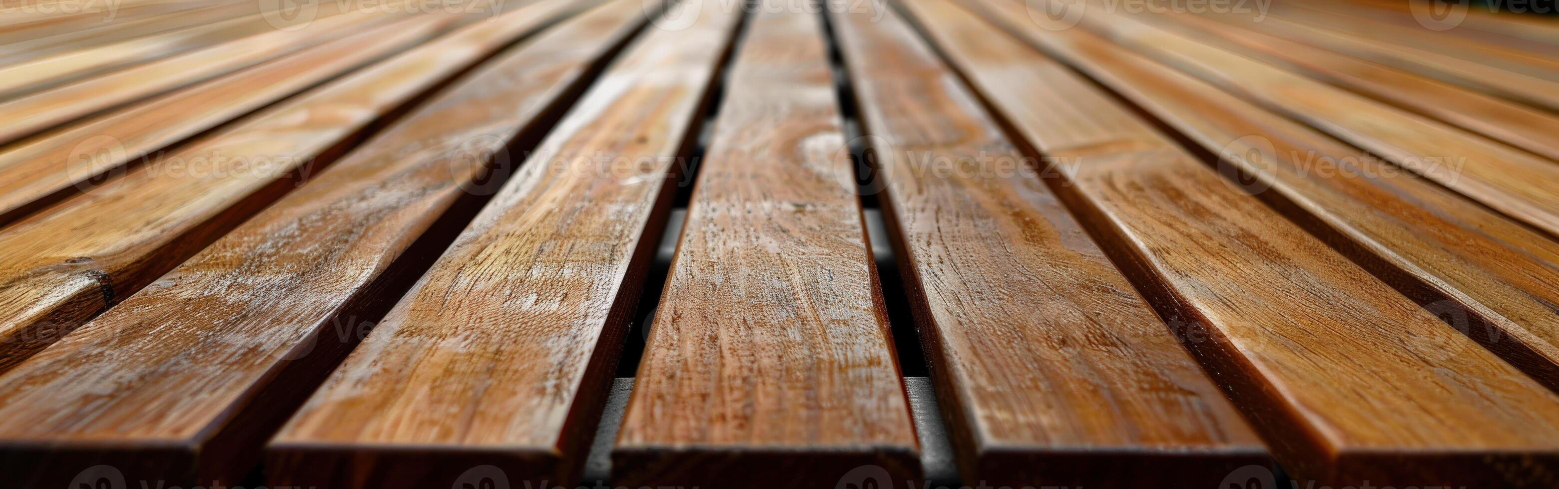 Close-up view of polished wooden decking in natural light photo