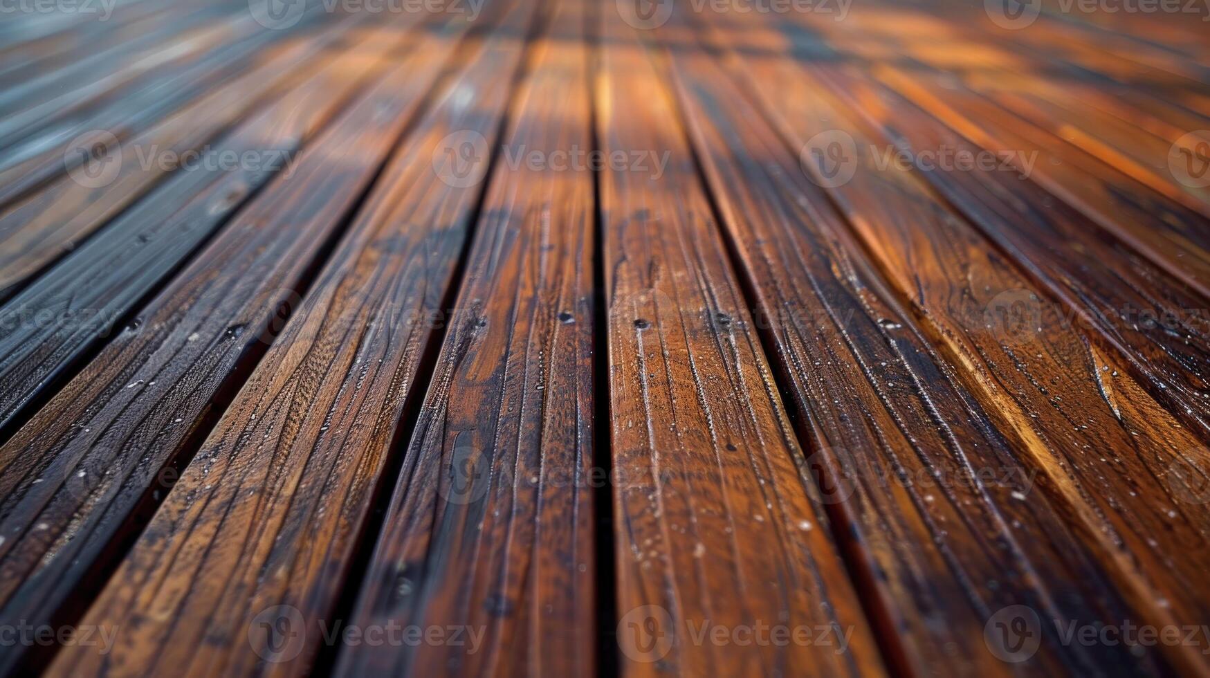 Wet wood decking with rich textures and warm tones in sunlight photo