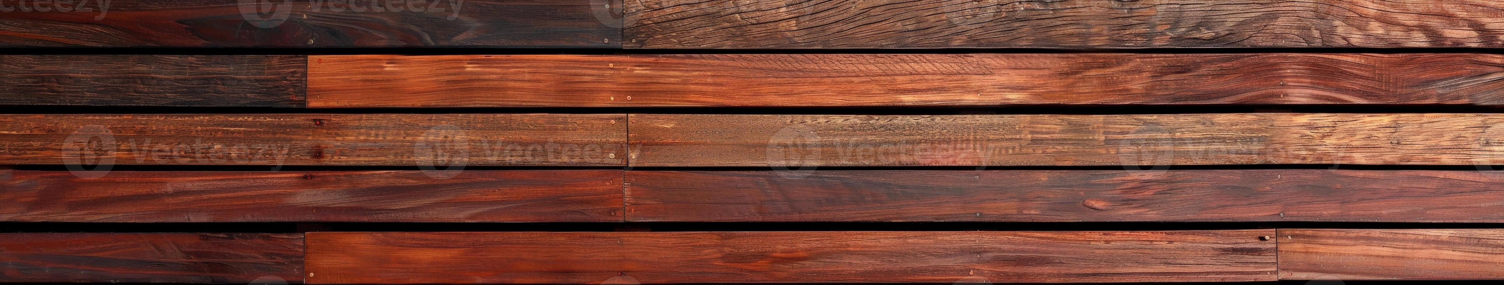 Wood decking boards arranged in a warm-toned pattern photo